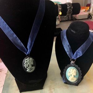 2 handmade skull ribbon pendants